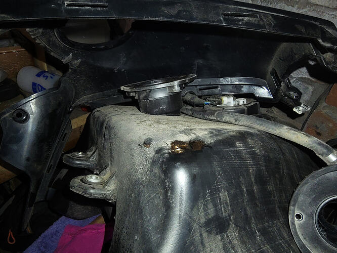 2) Inlet and top of fuel tank